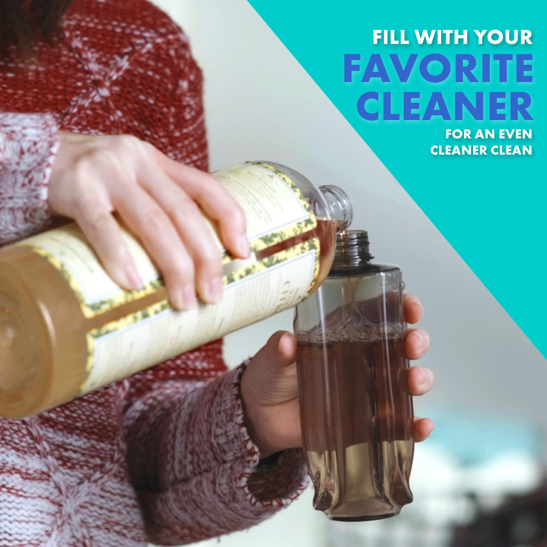 A woman filling the Roommate Spray Mop's refillable spray bottle with cleaning solution